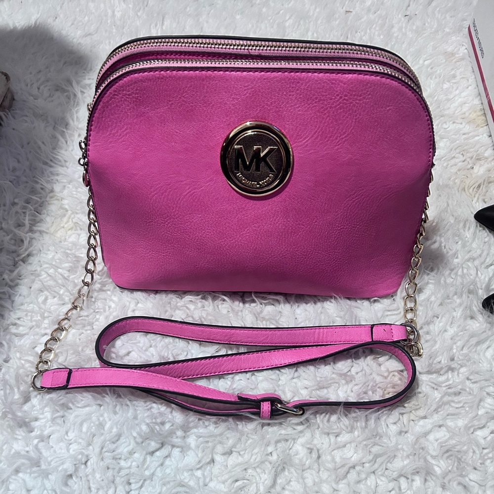 MK cross body hot bubblegum pink bag ps1 wear on bottom